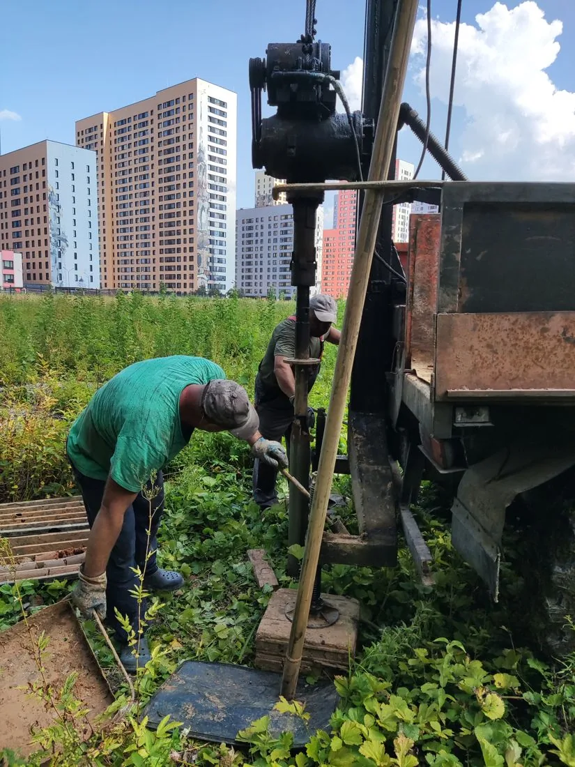 Drilling a borehole next to new residential developments